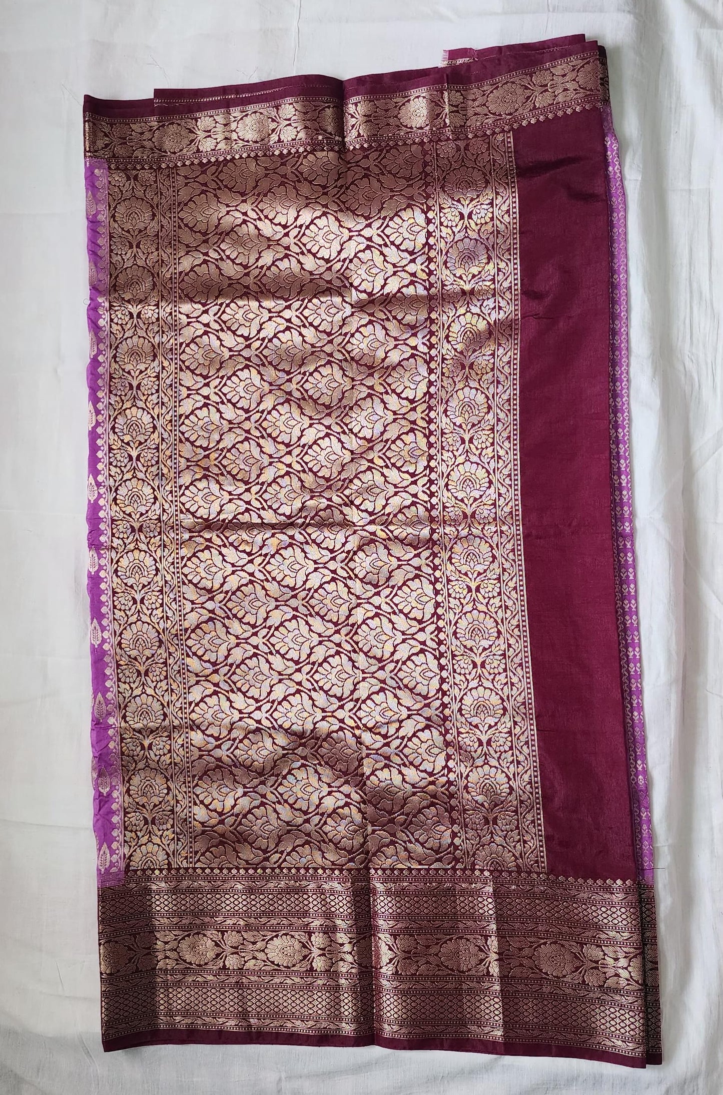 Purple Banaras Raw Mango Silk Saree with Zari Border & Red Choli – A Statement in Tradition