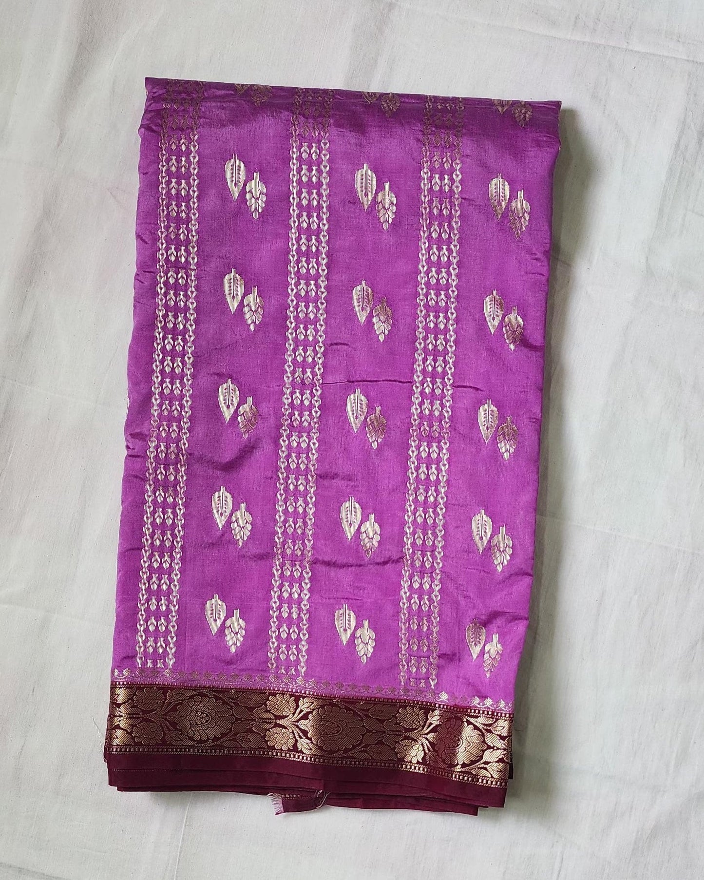 Purple Banaras Raw Mango Silk Saree with Zari Border & Red Choli – A Statement in Tradition
