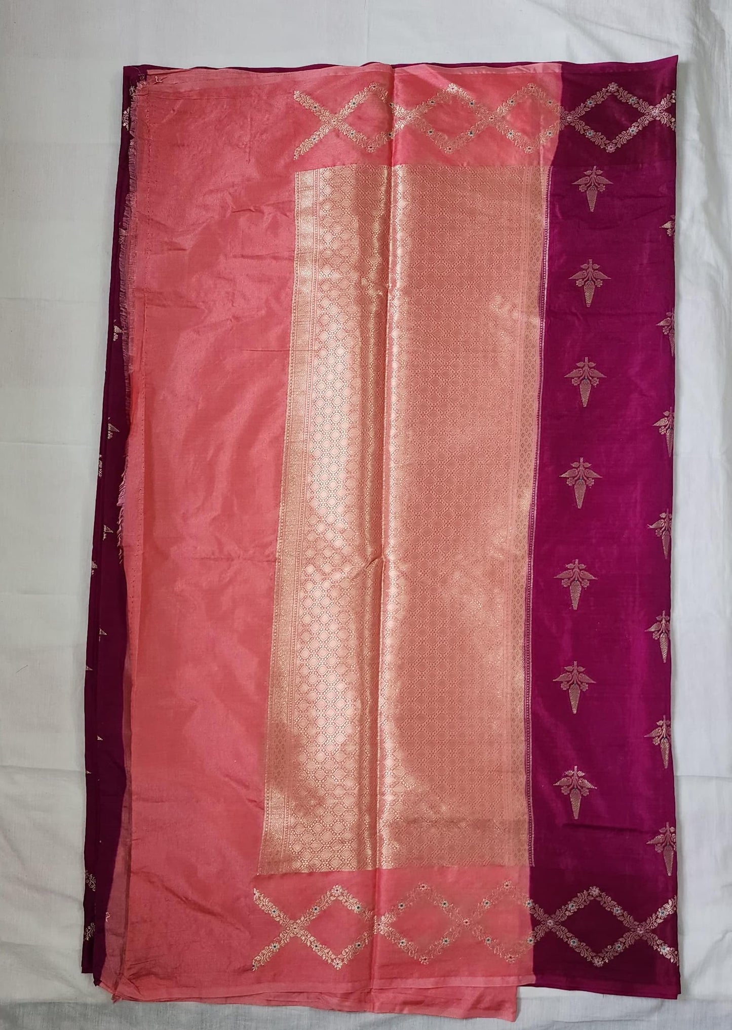 Pink Banaras Raw Mango Silk Saree with Rich Peach Pallu – A Symphony of Elegance and Contrast