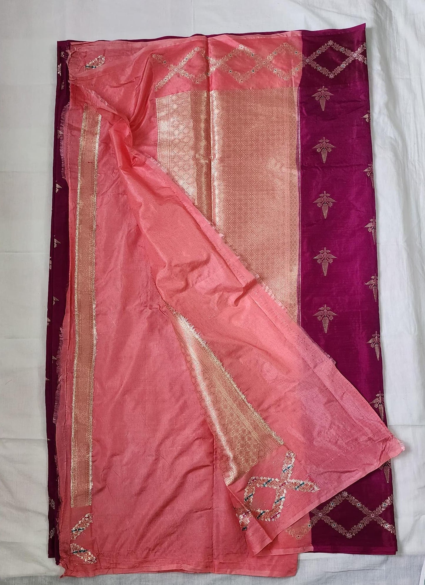 Pink Banaras Raw Mango Silk Saree with Rich Peach Pallu – A Symphony of Elegance and Contrast