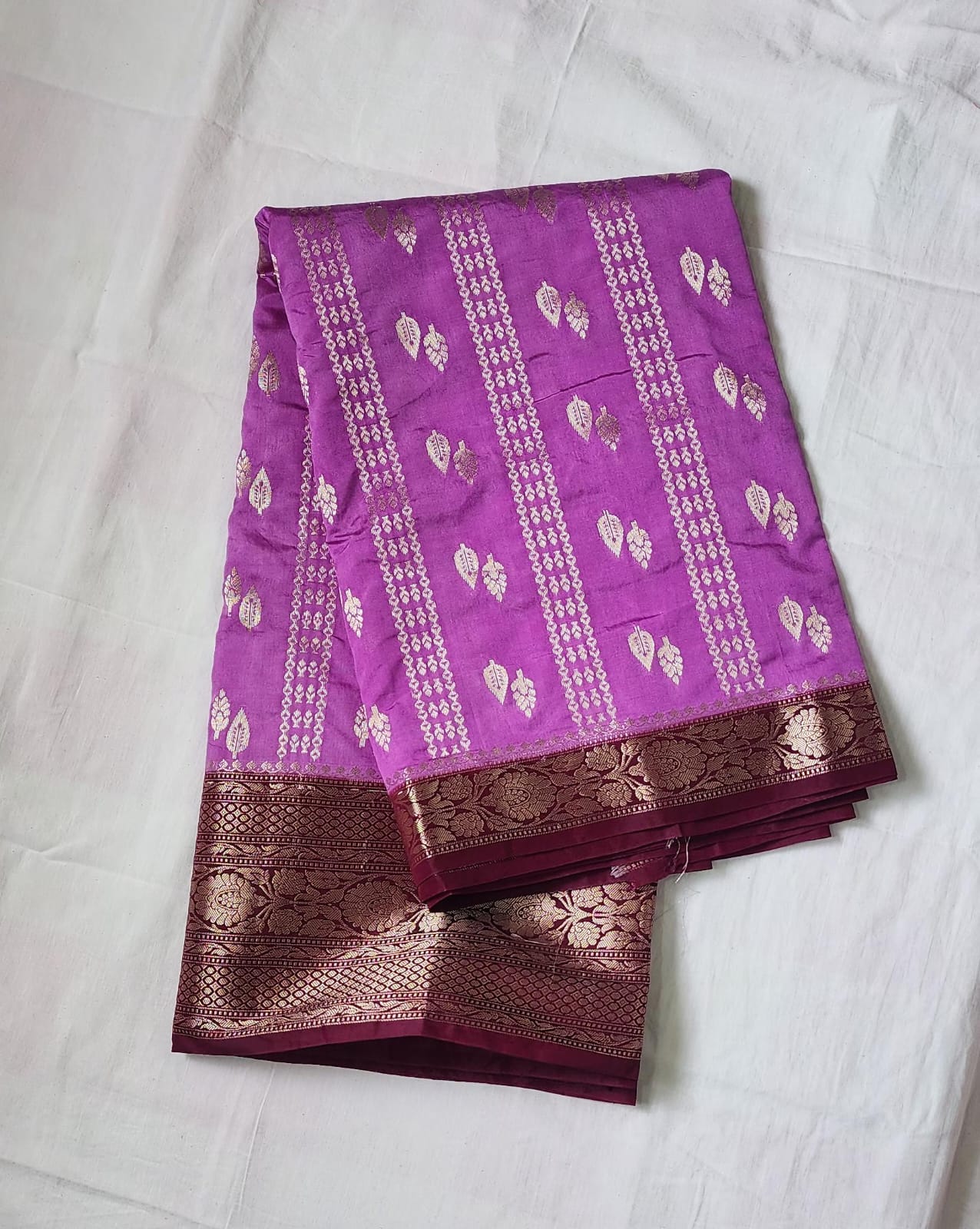 Purple Banaras Raw Mango Silk Saree with Zari Border & Red Choli – A Statement in Tradition